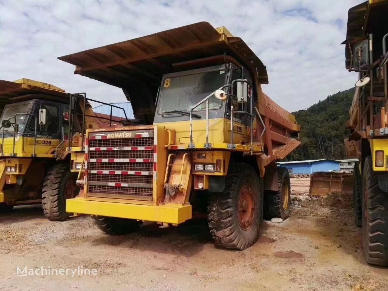 karjäärikallur Komatsu HD325-6 rock  dump truck